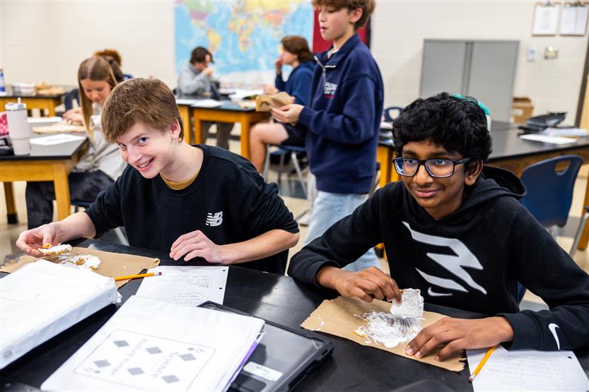 Students do a science experiment
